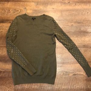 Express sweater with gold embellishments on sleeve